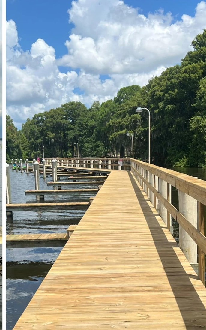 Boardwalk restored to fresh wood color after cleaning