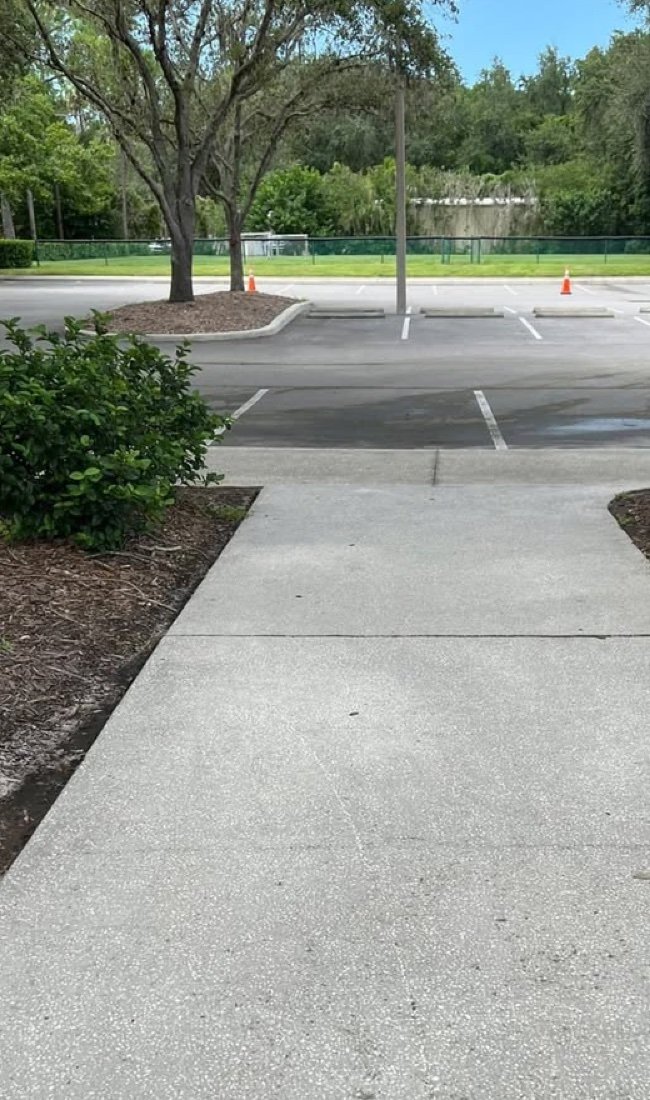 Clean sidewalk after pressure washing